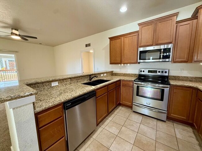 Building Photo - Fantastic 2 Bedroom, 2 Bath Ground Level Condo With Detached Garage in Loveland, Colorado Unit 103