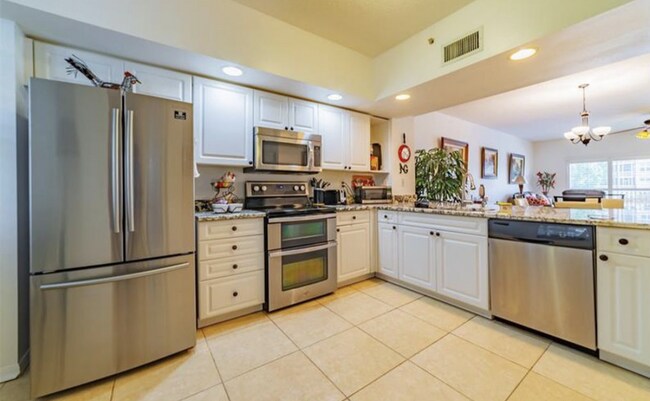 Kitchen - 1200 Country Club Dr Unit 4104