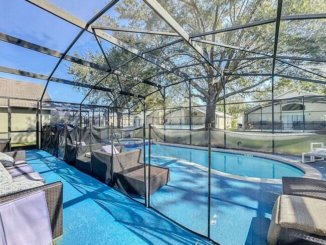 Photo - STUNNING Emerald Island Resort 5 bedroom 4.5 bath Luxury Home FULLY FURNISHED! 3 miles from Disney!