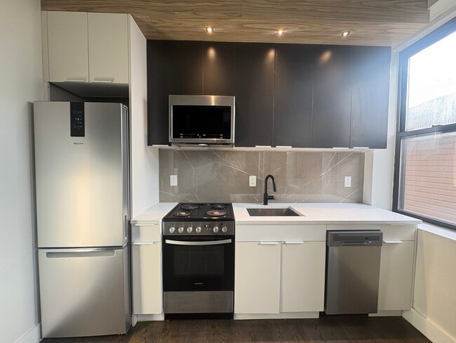 Building Photo - 64 Irving St Unit 305