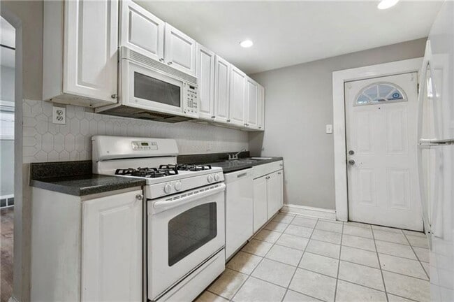 Photo - Charming 2-Bedroom Home with Tall Ceilings & Backyard Deck in Coraopolis