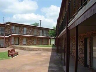 Woodland Arms Apartments - Magnolia Flats Apartments