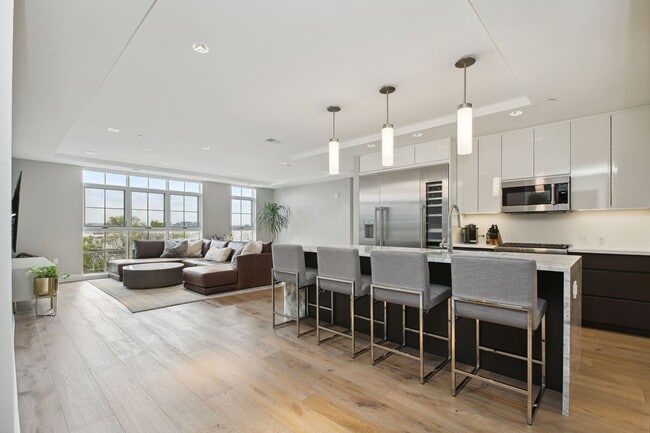 Building Photo - Elegant 2BR at The Adora | 1,500+ SF, Chef’s Kitchen & Garage Parking!