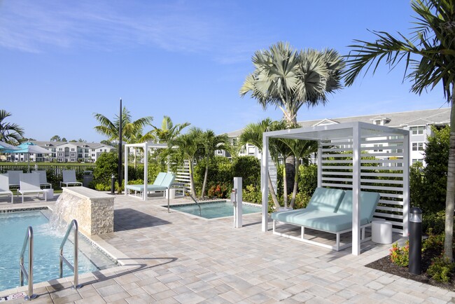 Pool Deck with Heated Spa at Everly Apartments in Naples, FL - Everly