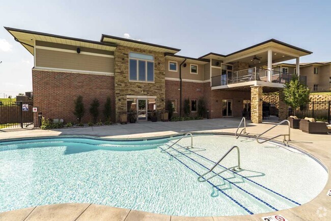 Hot days call for cool swims in our resort-style swimming pool. - Villas of Omaha at Butler Ridge Rental