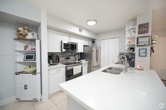 Building Photo - 11133 SW 8th St Unit 202 Rental