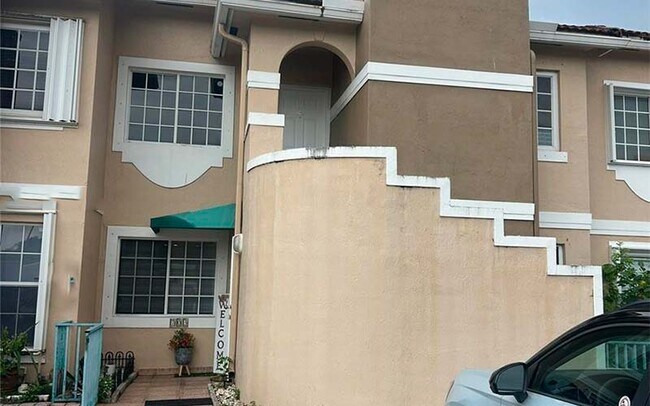Building Photo - 6425 SW 130th Pl Unit 1-704
