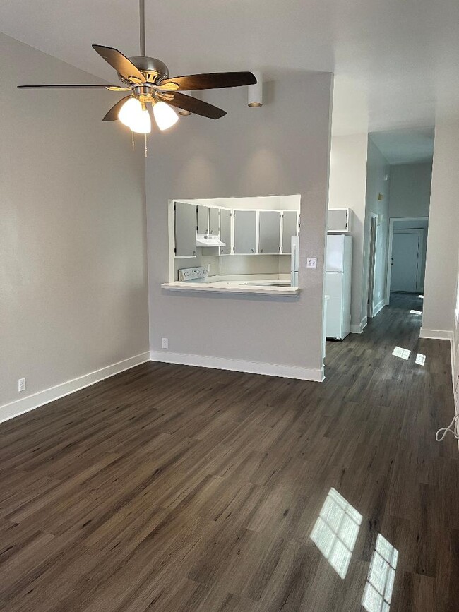 Den looking at kitchen - 739 Valence St Unit 739