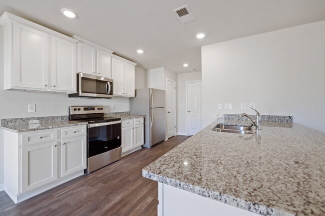 Photo - Modern 3BR Home with Granite Kitchen & 2-Car Garage – Minutes from Downtown in Meredith Woods!