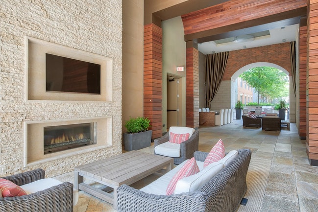 Enjoy our outdoor Loggia with plush seating and TVs
