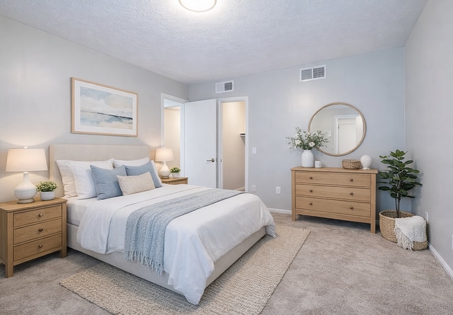 Calm neutral bedroom with cozy accents