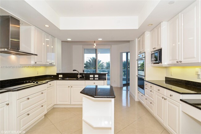 Building Photo - 21200 Point Pl Unit 404 Rental
