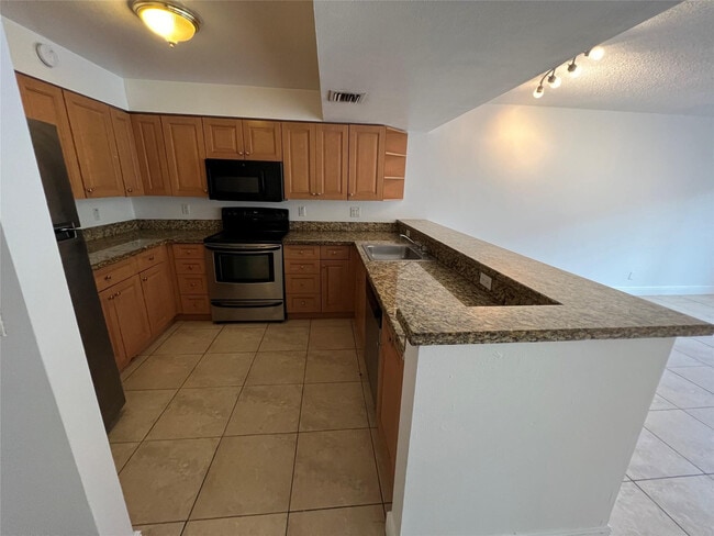 Photo - 5221 Geneva Ct Unit 208