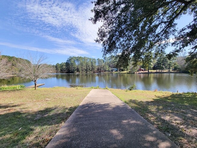 Photo - Escape to your updated 3-bed, 2-bath oasis in Goodrich, TX, featuring modern finishes, an open la...