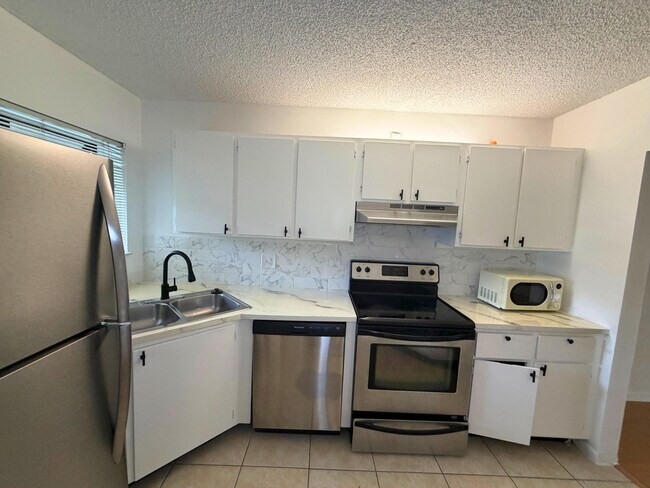 Photo - 1244 S Military Trail Unidad 724