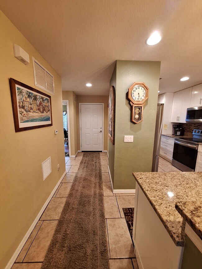 Beautifully upgraded Ground Floor condo with lake view