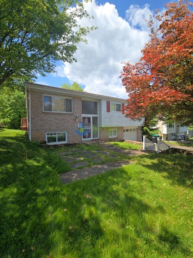 Building Photo - Charming 3-Bedroom Pittsburgh Home with Fireplace, Balcony & Garage Parking