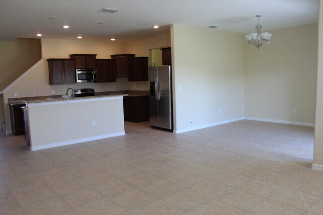 Photo - Spacious 3BR Lake Nona Townhome Near Medical City | 2,319 Sq Ft | 2-Car Garage
