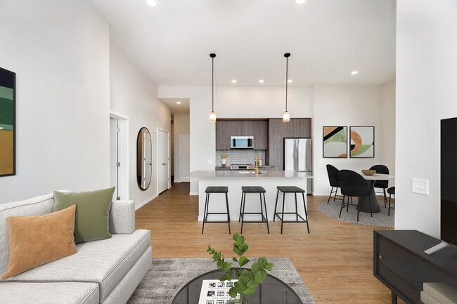 Signature Collection kitchen and living area with hard surface flooring