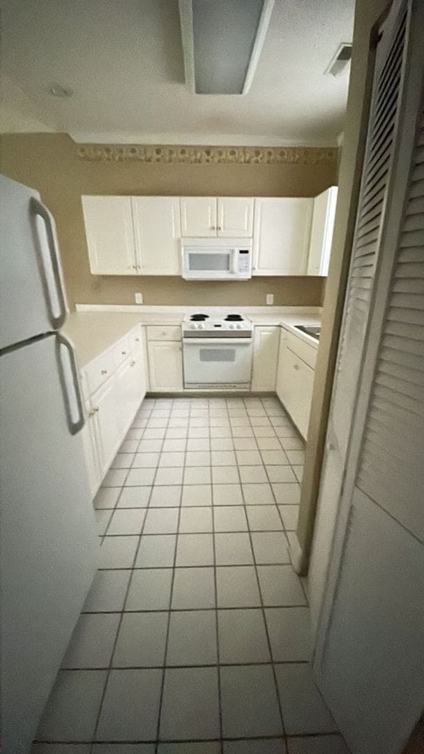 Photo - REDUCED! Large Unfurnished 2 Bedroom Condo... Unit 203-36