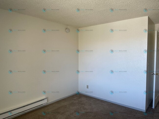 Photo - This delightful 2-bedroom, 1-bathroom condo perched upstairs offers an irresistible opportunity y...