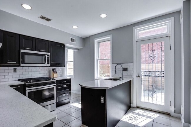 Photo - Capital Hill East Townhouse | 3 bd 2.5 bth | Two Patios | Hardwood Floors