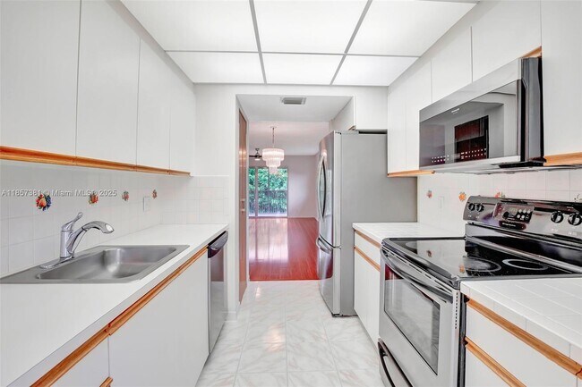 Building Photo - 1200 SW 125th Ave Unit 415L Rental