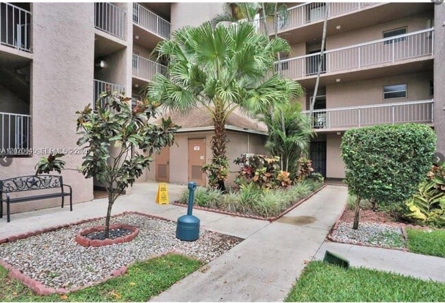 Building Photo - 9480 Tangerine Pl Unit 404