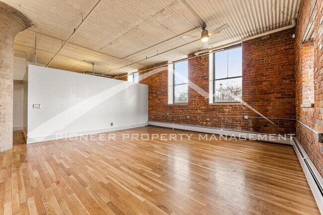 Photo - Charming Downtown Condo Unit with 2 Includ...