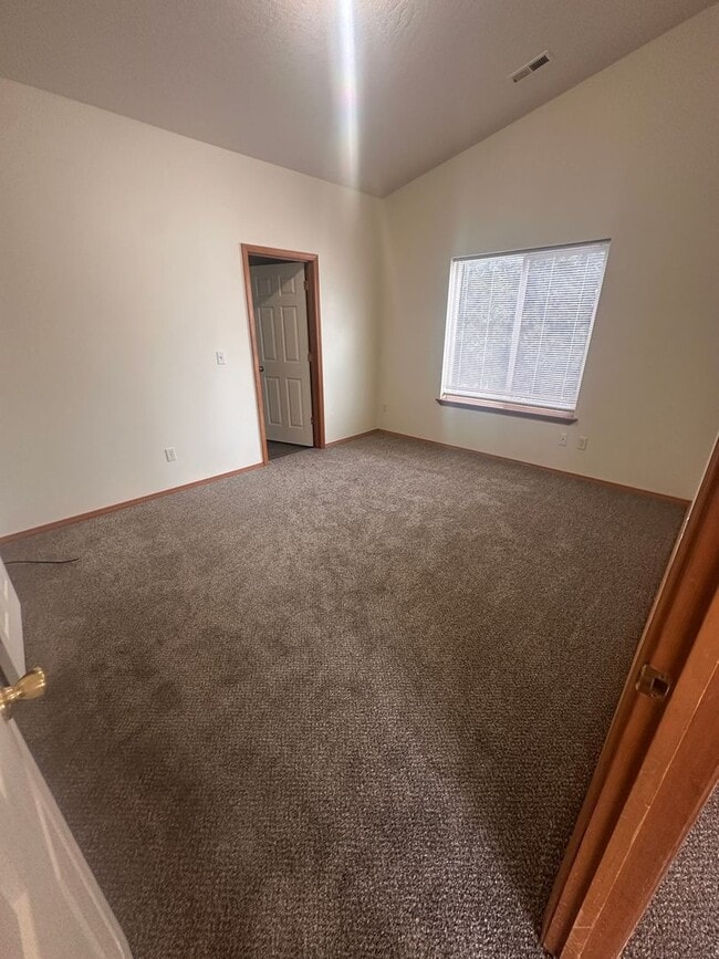 Photo - Newer Carpet, flooring & paint! 3 Bedroom 2 Bath with 2 car attached garage.