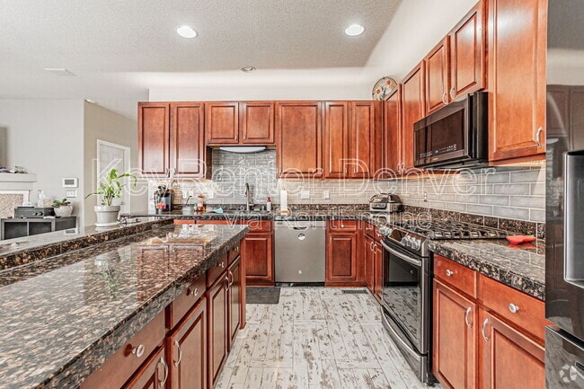 Building Photo - 15612 E 96th Way Rental