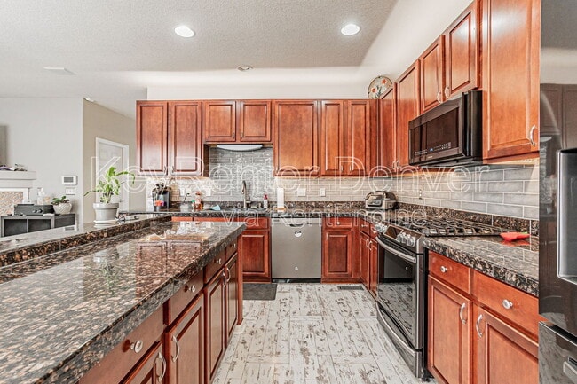 Photo - 15612 E 96th Way Townhome