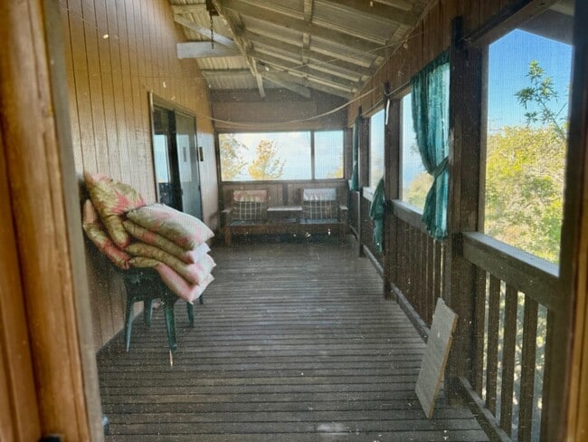 Photo - Experience comfort in this charming 3 bed, 2 bath rental home with a wood-burning stove, sunken j...