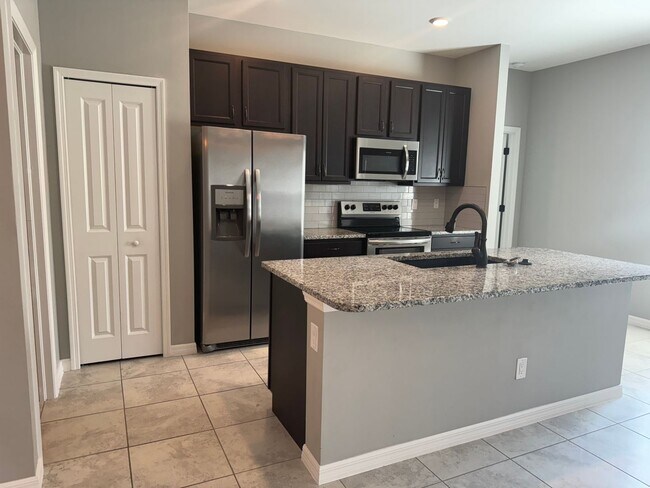 Photo - 3 Bed + Den with 2 Baths & 2 Car Garage