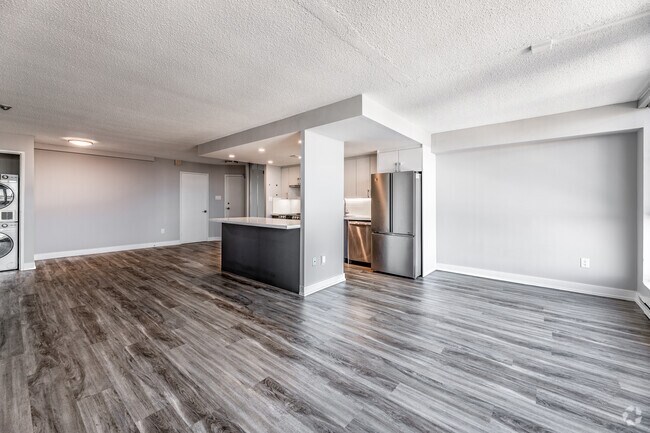 2BR, 1BA - 1,078SF - Living Room/Kitchen - Waterford Tower