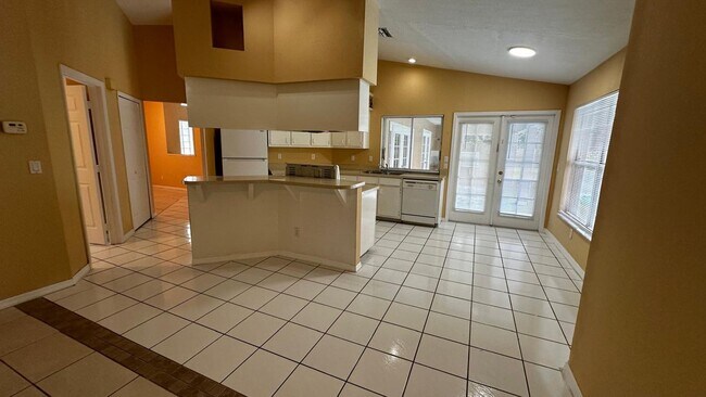 Photo - SPACIOUS 4-BEDROOM HOME WITH SCREENED POOL IN SE CAPE CORAL