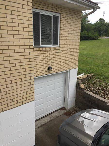 newly installed garage door 2017, new retaining wall 2018