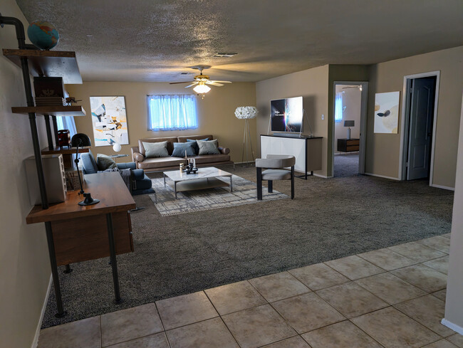 Living room is large enough to include a computer work area if desired or a formal dining set - 2491 Canyon Lake Forest #B House