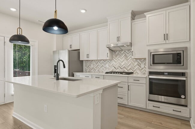 Photo - Move-In Ready 4BR Home | Deck, Patio & Open Concept Living