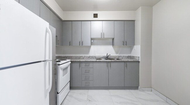 Building Photo - 3201 Lawrence Ave E