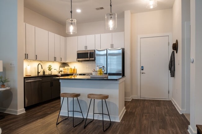 Stainless steel appliances including side-by-side refrigerator