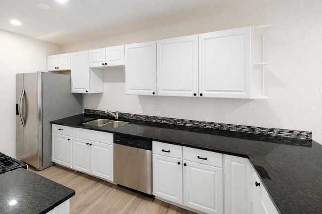 Renovated, bright, and open kitchen. Perfect for everyday living and easy entertaining. - 5917 Little Creek Trl