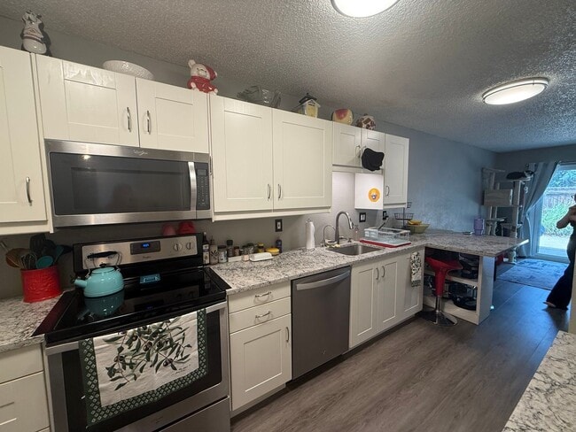 Photo - Updated Townhome Backing to Open Space in Prime Lafayette Location