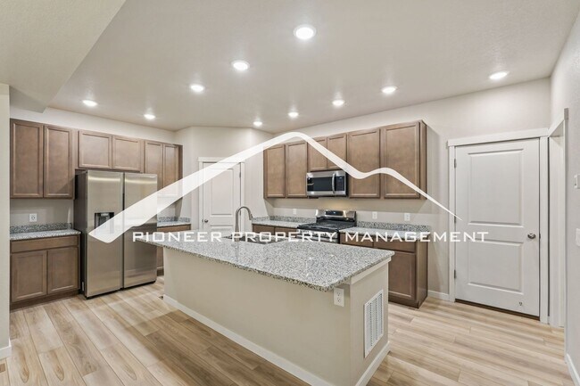Photo - Spacious 4-Bedroom Home with Newly Finished Basement Near COS Airport, Fort Carson & Peterson SFB