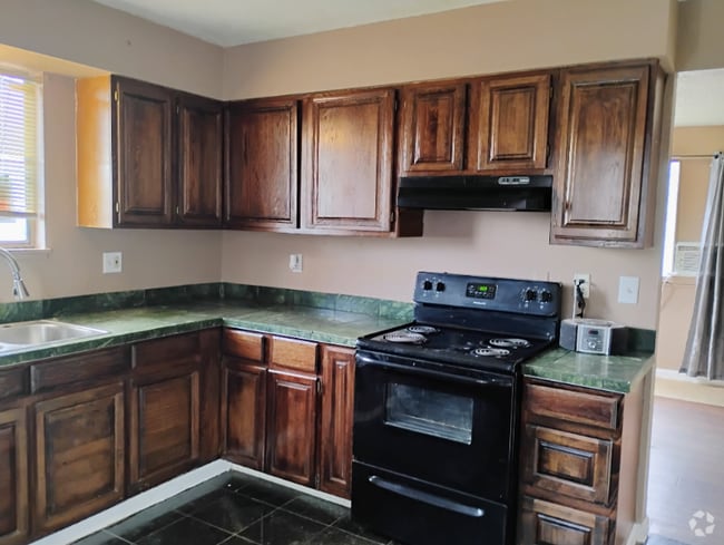Building Photo - 6751 E 72nd Pl Unit H Rental