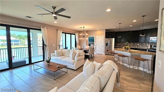 Building Photo - 15145 Palmer Lake Cir Unit 201