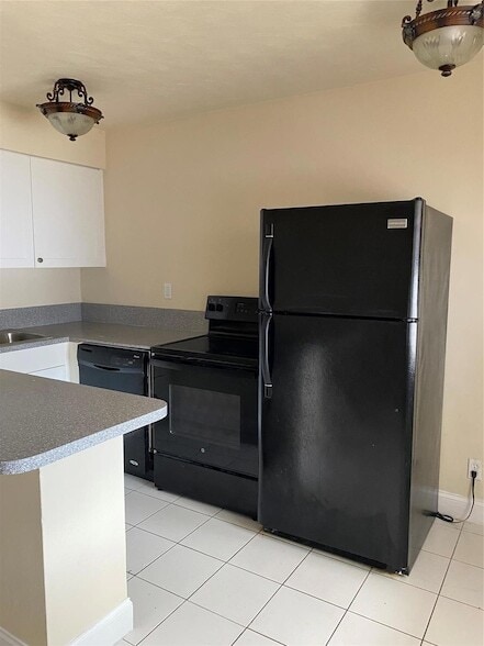 Building Photo - 1219 NE 14th Ave Unit 4