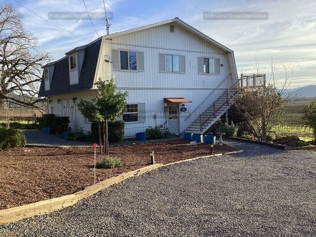 Photo - Upper Carriage house Flat with deck & expansive Vineyard and Sunset views