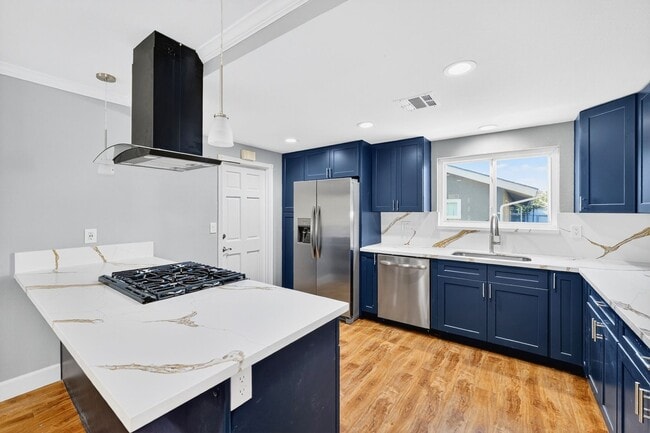 Building Photo - 2381 N Bellflower Blvd