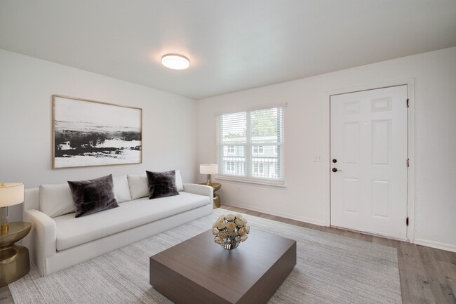 Bright Open Living Area - Sunset Gardens Apartments